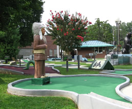 Holes at Laura E. Corn Mini-Golf at Boyd Park have local motifs. - Laura E. Corn Mini-Golf at Boyd Park near Meadowbrook Log Cabin