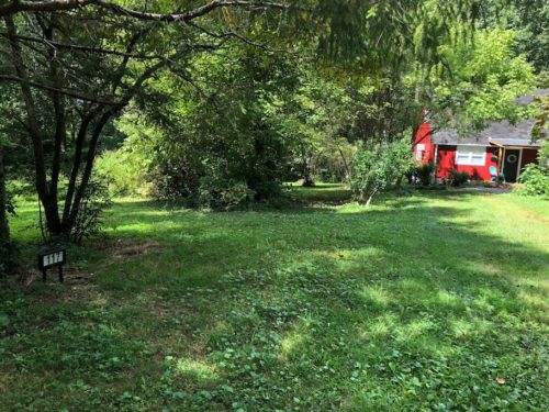 This adorable barn style cottage home is set back from the road with plenty of privacy. - Apple Barn Cottage in Flat Rock