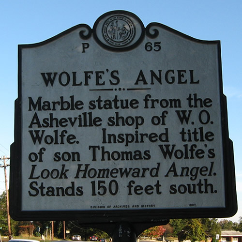 Wolfe's Angel Marble statue from the Asheville shop of W.O. Wolfe. Inspired title of son Thomas Wolfe's Look Homeward Angel. Stands 150 feet south. - Look Homeward Angel (Thomas Wolfe's Angel) - Look Homeward Angel at Oakdale Cemetery – Near Meadowbrook Log Cabin, Hendersonville, NC