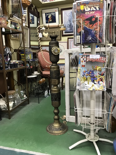 Old Comics and a strange telephone - Needful Things Antique Mall – Shopping near Meadowbrook Log Cabin, Hendersonville, NC