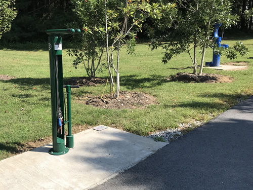 Bicycle Bicycle FixIt Station and Water Fountain on Oklawaha Greenway Trail – Things to Do Near Meadowbrook Log Cabin