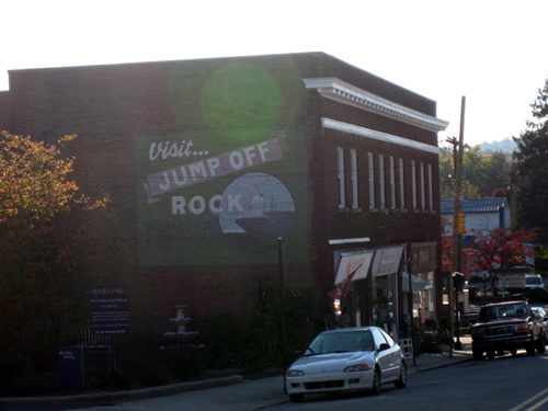 Visit Jump Off Rock Mural on the east side of the Brooks building, Downtown Hendersonville's Historic Business District, North Carolina near Meadowbrook Log Cabin