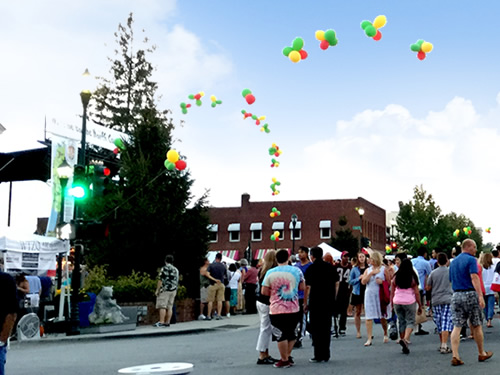 North Carolina Apple Festival in Hendersonville has children activities, car shows and educational exhibits. - North Carolina Apple Festival - Things to do near Meadowbrook Log Cabin