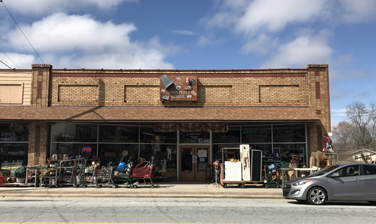 You know you're there when you see the sidewalk - Junk & Disorderly – Indoor Flea Market near Meadowbrook Log Cabin
