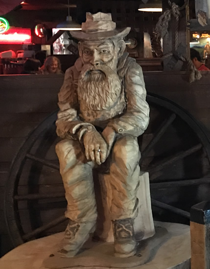Marvin "Popcorn" Sutton 10/05/1946 Maggie Valley, NC 03/16/2009 Parrotsville, TN Carved for Binions by "Mountain" Mike Ayerso of Whetstone Woodworks Maggie Valley, NC at Binions Roadhouse in Hendersonville, NC