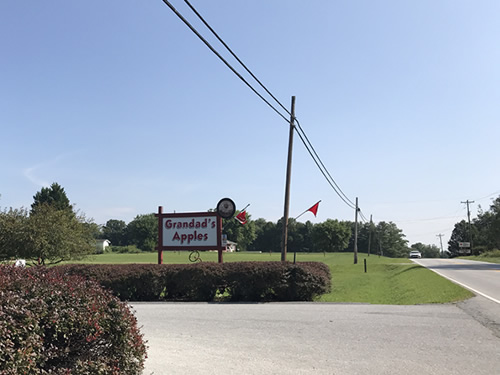 The sign for Grandad's Apples from 64 (Chimney Rock Road)