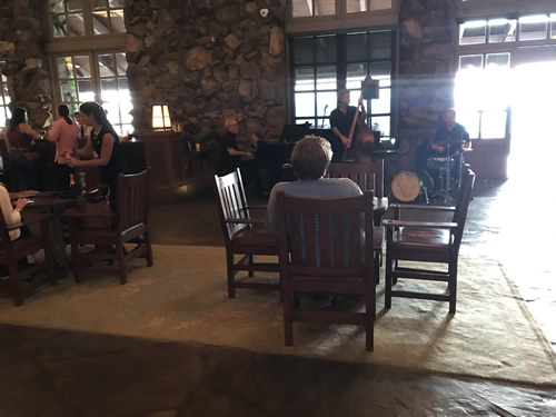 Have a drink and listen to a light piano jazz while you wait for your table.