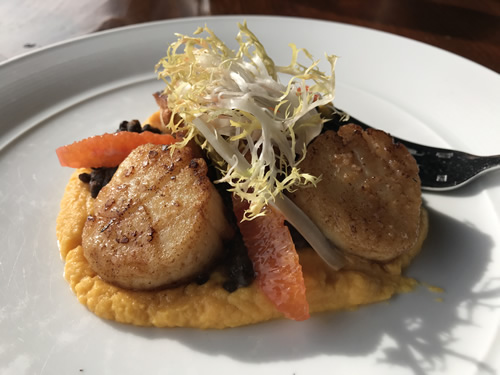 Seared Diver Scallops with black lentils / rutabaga / chanterelles / blood orange / frisée at the Grove Park Inn Sunset Terrace