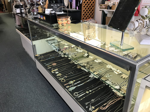 The Beehive has cases with new and consignment jewelry. - Beehive Resale Shop 449 N Main St, Hendersonville, NC