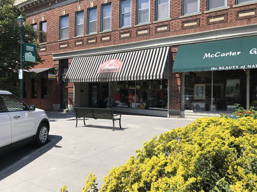 The Beehive Resale Shop is at 449 N Main St, Hendersonville, NC. It is right at the corner by the McCarter Gallery.