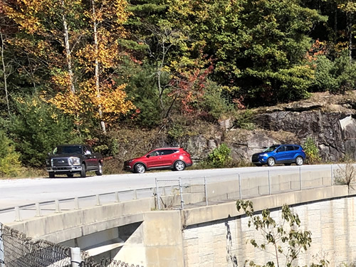 There is a safe place to pull off the road now on the east side of the water fall.